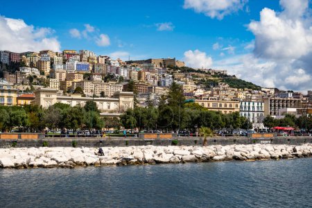 Photo for Naples, Italy - April 9, 2023: City of Naples seen from the seafront of Naples in Italy - Royalty Free Image