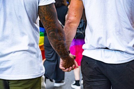 Photo for Naples, Italy - July 1, 2023: Some participants in Gay Pride every year brings together thousands of gay people and not to claim the rights to sexual freedom and against homophobia. - Royalty Free Image