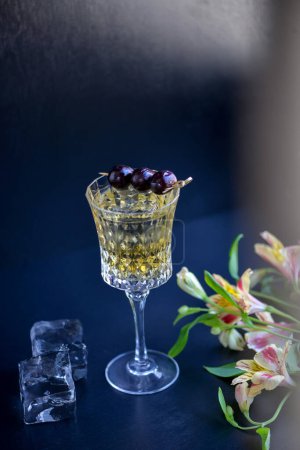 Photo for Old fashion alcoholic cocktail in a glass on background - Royalty Free Image