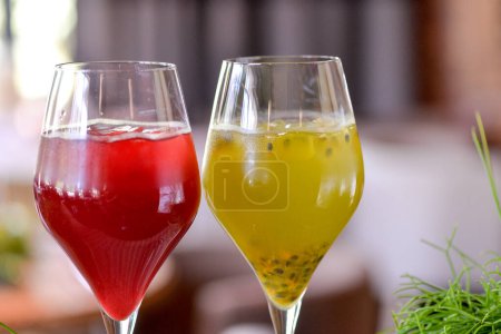 Photo for Two different natural lemonades with passion fruit and raspberry - Royalty Free Image