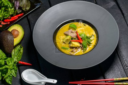 Photo for Close up view of delicious soup with meat and peppers - Royalty Free Image