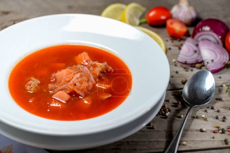 Photo for Ukrainian red borsch  in a white plate - Royalty Free Image