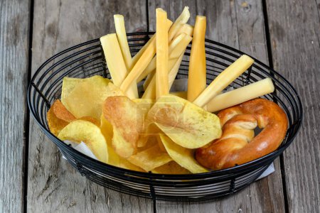 Photo for Fresh organic potato chips with fries and bun - Royalty Free Image