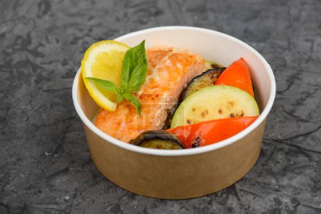 Photo for Salmon with grilled vegetables on the table - Royalty Free Image
