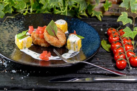 Photo for Fried cutlets with corns, and herbs on background, close up - Royalty Free Image