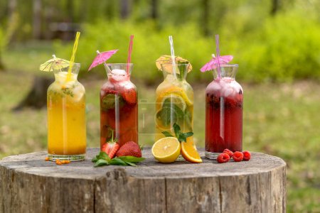 Photo for Refreshing drinks with strawberry and orange, summer drinks concept - Royalty Free Image