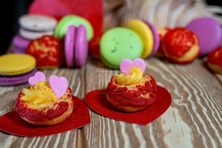 Photo for Delicious and colorful sweets on wooden table - Royalty Free Image