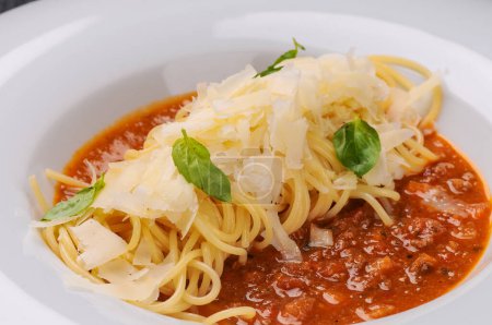 Photo for Spaghetti bolognese  in white plate on background - Royalty Free Image