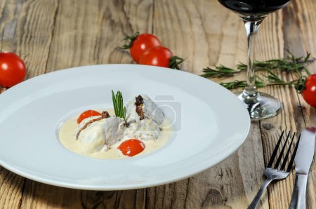 Photo for Grilled meat with sauce and tomatoes and wine - Royalty Free Image