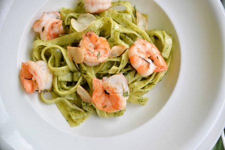 Photo for Pasta with shrimps on plate on  background close up - Royalty Free Image