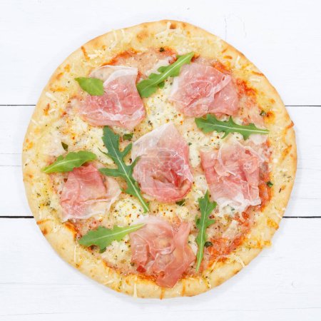 Foto de Ham pizza prosciutto square from above on wooden board wood - Imagen libre de derechos