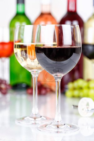 Photo for Red wine in a glass portrait format grapes alcoholic beverage - Royalty Free Image
