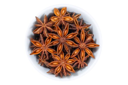 Téléchargez les photos : Star anise star-anise Christmas spice herb from above bowl isolated on a white background - en image libre de droit