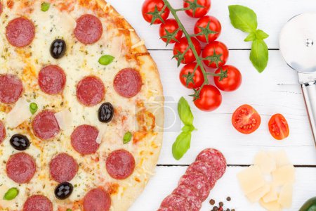 Photo for Pizza pepperoni salami from above baking ingredients close up on wooden board wood - Royalty Free Image