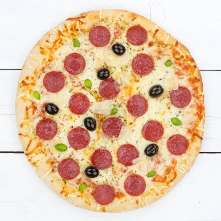 Photo for Pizza pepperoni salami square from above on wooden board wood - Royalty Free Image