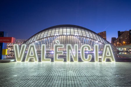 Photo for Valencia, Spain - February 17, 2022 Ciutat de les Arts i les Ciencies with Hemisferic building modern architecture by Santiago Calatrava at night in Valencia, Spain. - Royalty Free Image