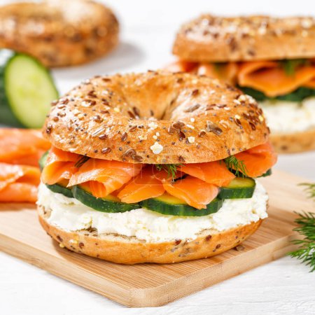 Photo for Bagel sandwich with salmon fish and cream cheese for breakfast square - Royalty Free Image