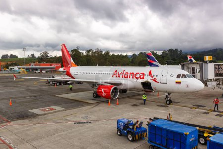 Photo for Medellin, Colombia - April 20, 2022 Avianca Airbus A320 airplane at Medellin Rionegro airport (MDE) in Colombia. - Royalty Free Image