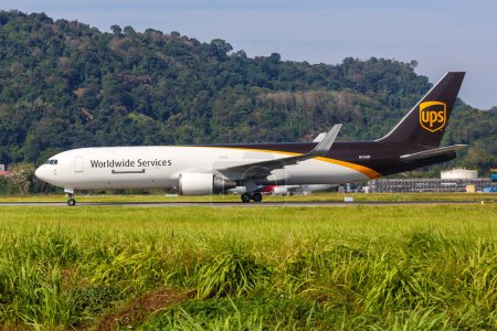 Photo for Penang, Malaysia - February 8, 2023 UPS United Parcel Service Boeing 767-300F airplane at Penang Airport in Malaysia. - Royalty Free Image