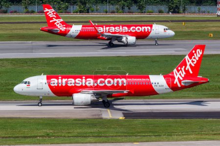 Téléchargez les photos : Changi, Singapour - 3 février 2023 Indonésie AirAsia Airbus A320 avions à l'aéroport de Changi (SIN) à Singapour. - en image libre de droit