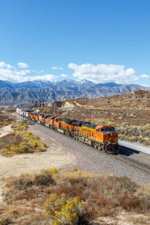 Photo for Los Angeles, United States - November 3, 2022 BNSF Railway freight train portrait format at Cajon Pass near Los Angeles, United States. - Royalty Free Image