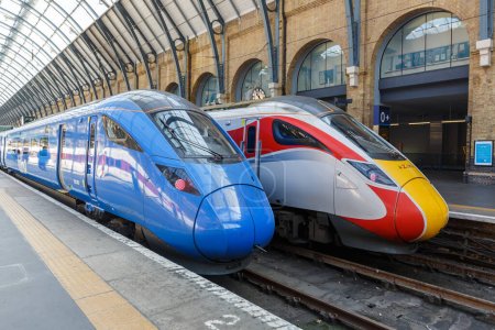 Photo for London, United Kingdom - April 29, 2023: Azuma high speed trains of London North Eastern Railway LNER and Lumo of FirstGroup at King's Cross train station in London, United Kingdom. - Royalty Free Image