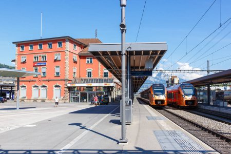 Photo for Arth, Switzerland - August 11, 2023: Passenger trains type Stadler Flirt of Sudostbahn at railway station in Arth-Goldau, Switzerland. - Royalty Free Image