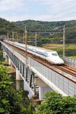 Photo for Kurashiki, Japan - October 1, 2023: Shinkansen N700 high-speed train operated by Japan Rail JR on Sanyo Shinkansen line in Kurashiki, Japan. - Royalty Free Image