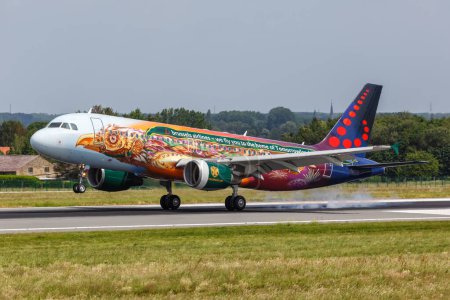 Photo for Brussels, Belgium - May 21, 2022: Brussels Airlines Airbus A320 airplane at Brussels Airport (BRU) in the Tomorrowland special livery in Belgium. - Royalty Free Image