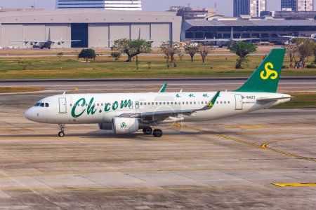 Photo for Bangkok, Thailand - February 14, 2023: Spring Airlines Airbus A320 airplane at Bangkok Don Mueang Airport in Thailand. - Royalty Free Image