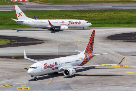 Téléchargez les photos : Changi, Singapour - 3 février 2023 : Avions Batik Air Boeing 737 à l'aéroport de Changi à Singapour. - en image libre de droit
