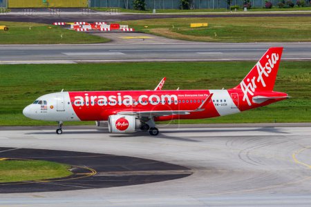 Photo for Changi, Singapore - February 3, 2023: AirAsia Airbus A320neo airplane at Changi Airport in Singapore. - Royalty Free Image