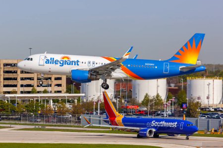Photo for Chicago, United States - May 4, 2023: Allegiant Air and Southwest Airlines Airbus and Boeing airplanes at Chicago Midway Airport (MDW) in the United States. - Royalty Free Image