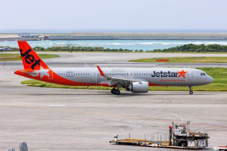 Photo for Okinawa, Japan - October 3, 2023: Jetstar Japan Airbus A321neo airplane at Okinawa Naha Airport (OKA) in Japan. - Royalty Free Image