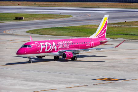 Photo for Kobe, Japan - October 2, 2023: Fuji Dream Airlines FDA Embraer 175 airplane at Kobe Airport (UKB) in Japan. - Royalty Free Image