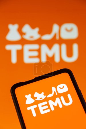Photo for Stuttgart, Germany - July 19, 2023: Temu logo online marketplace ecommerce on a mobile phone and computer screen in Stuttgart, Germany. - Royalty Free Image