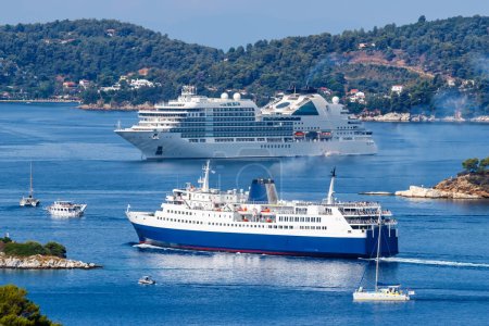 Photo for Cruise ship, ferry and boats boat in the Mediterranean Sea Aegean island of Skiathos, Greece - Royalty Free Image