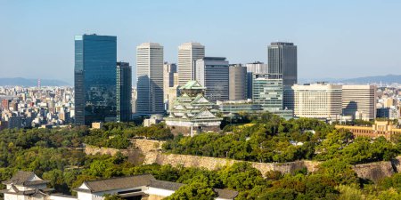 Photo for Osaka Castle from above skyline with skyscraper panorama town in Japan - Royalty Free Image