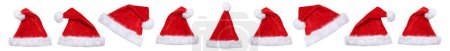 Photo for Christmas Santa Claus hats hat in a row winter panorama Clause isolated on a white background - Royalty Free Image