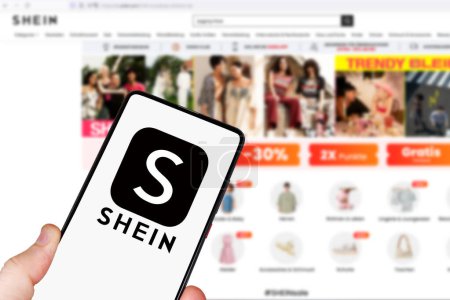 Photo for Stuttgart, Germany - May 1, 2024: Shein logo online marketplace ecommerce on a mobile phone and computer in Stuttgart, Germany. - Royalty Free Image