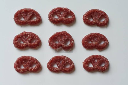 pretzls from salami on the white background