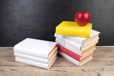 Photo for Books, books on the background school board. Back to school. Education. Copy space for text - Royalty Free Image