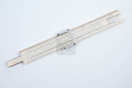 Photo for Logarithmic ruler on white background. Stationery for engineers and students - Royalty Free Image