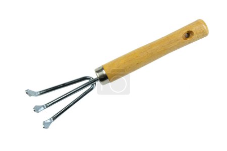 Photo for Small garden rake isolated on a white background. Tool. Top view - Royalty Free Image