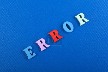 Photo for ERROR word on blue background composed from colorful abc alphabet block wooden letters, copy space for ad text. Learning english concept - Royalty Free Image
