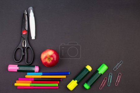 Photo for Back to school. Stationery on a black table. Office desk with copy space. Flat lay - Royalty Free Image