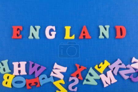 Photo for ENGLAND word on blue background composed from colorful abc alphabet block wooden letters, copy space for ad text. Learning english concept - Royalty Free Image