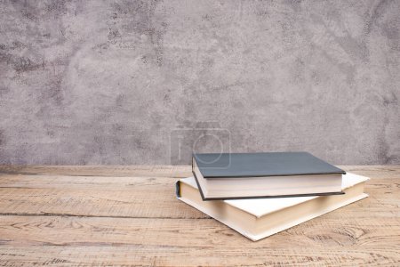 Photo for Open book, books on the gray concrete background. Back to school. Education. Copy space for text - Royalty Free Image