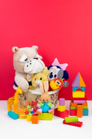 Photo for Collection of colorful toys on red background - Royalty Free Image