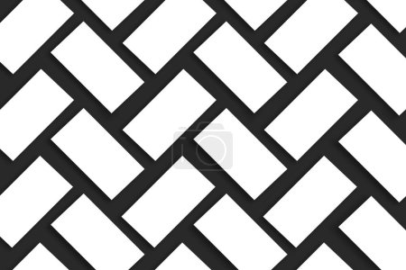 Téléchargez les photos : Maquette de piles de cartes de visite blanches disposées en rangées sur un fond de papier texturé noir - en image libre de droit
